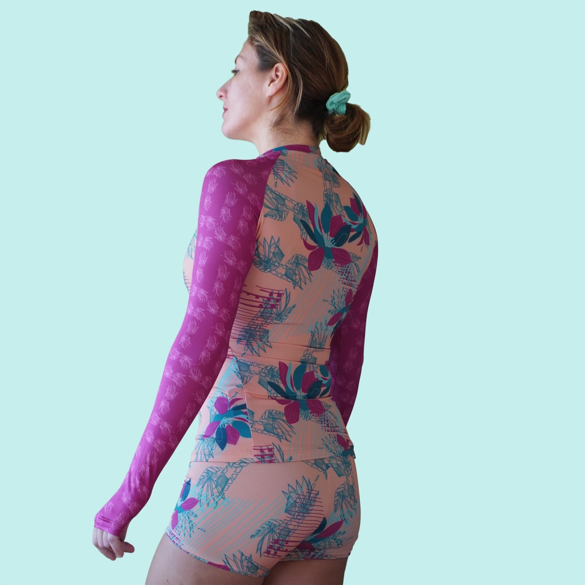 Second Skin Eco Friendly Rash Guard For Women With +50 UPF in Peach Tropical Rhapsody - Groove Rabbit